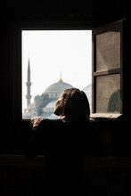 Woman Looking At Mosque