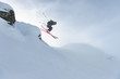 © RG&B Images/Stocksy - Female skier jumping