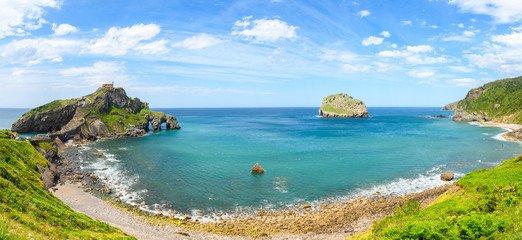 Wall Mural - sunny day at gaztelugatxe island, located at basque country coastline