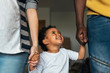 © Santi Nunez/Stocksy - Happy family having fun at home