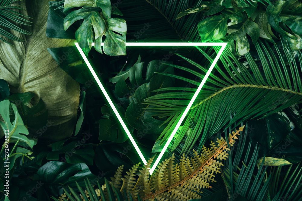 Creative layout made of tropical leaves. Flat lay. Nature concept. - obrazy, fototapety, plakaty 
