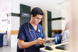 © Per Swantesson/Stocksy - Young male doctor with a tablet