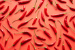 © 365mm/Stocksy - Hot chilli peppers background.