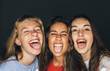 © MyMicrostock/Stocksy - Studio portrait of cute teen girls sticking out tongue