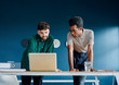 © W2 Photography/Stocksy - Two young creative enterpreneurs working in a modern office.