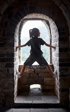 Beautiful Asian Little Girl Playing In The Great Wall