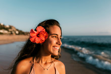 Portrait Of Teen Girl With A Hibiscus Flower
