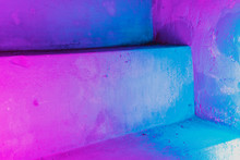 Old Staircase Lit By Colorful Neon Light