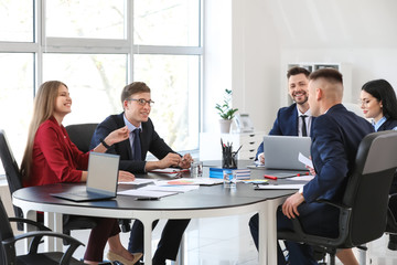 Team of business people during meeting in office