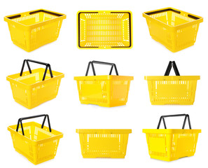 Set of plastic shopping baskets on white background