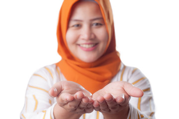 Wall Mural - Muslim Lady Shows Something in Her Empty Hands