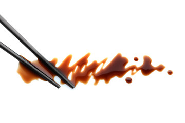 Wall Mural - Delicious soy sauce and chopsticks isolated on white, top view
