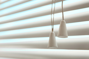 Closeup view of closed horizontal window blinds