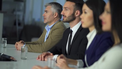 Wall Mural - The conference with business people at the table