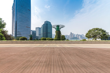 Wall Mural - Panoramic skyline and modern business office buildings with empty road,empty concrete square floor