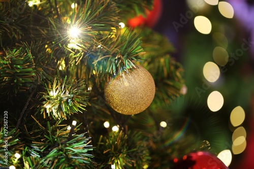 Christmas Tree With Ornaments And Lights Closeup Macro Buy