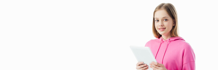 Wall Mural - panoramic shot of happy teenage girl holding digital tablet isolated on white