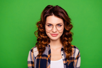 Close-up portrait of her she nice-looking lovely pretty winsome attractive cheerful cheery wavy-haired girl wearing checked shirt glasses isolated over bright vivid shine green background