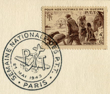 Paris, Republic Of France - 21 May 1945: French Historical Stamp: For Our War Victims. The Family Leaves Their Ruined Home, Special Postal Cancellation, Second World War