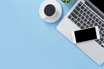 Business concept, relaxation in working time, drinking coffee taking a break on clean light blue office table, copy space, flat lay, top view, mockup