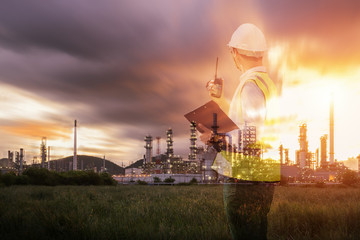 Industrial view Oil refinery and oil tanks plant during at twilight