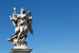 Fototapeta  - One of the angels at the famous Sant Angelo bridge, Rome, Italy.