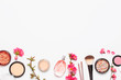 © olgaarkhipenko - Different makeup cosmetic. Ball blush rouge face powder lipstick concealer bottle of perfume eyeshadow makeup brush spring pink flowers on light background top view flat lay. Beauty fashion background