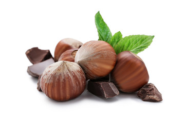 Poster - Hazelnuts with chocolate isolated on white background