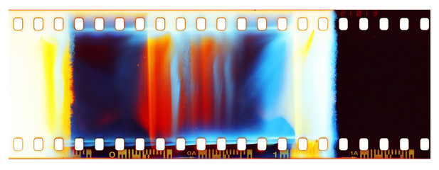 Film strip template, empty color 135 type (35mm) film with scratches, cracks, dust and light leaks isolated on white background with work path.