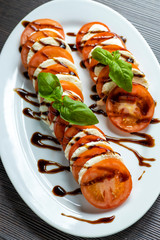 Wall Mural - classic caprese salad with balsamic cream