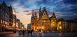 Wroclaw central market square with old houses, Town Hall and sunset, horse and carriage. Panoramic night view, long exposure.  Historical capital of Silesia, Wroclaw (Breslau) , Poland, Europe.