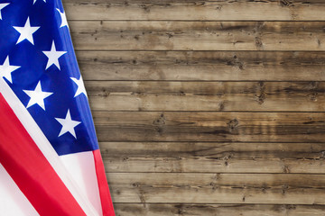 rippled usa flag for forth of july on wooden background fro american independence day concept