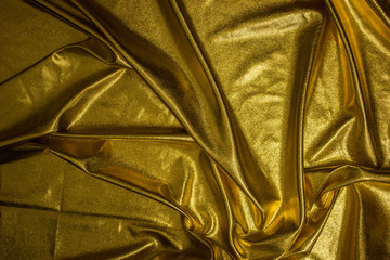 Texture of fabric Golden fabric wave background