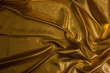Texture of fabric Golden fabric wave background