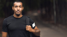 Sporty Man Posing After Workout, Wearing Black T-Shirt