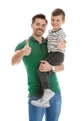 Wall Mural - Portrait of dad and his son isolated on white