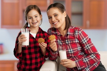 Sticker - Woman and child drinking milk and eating.