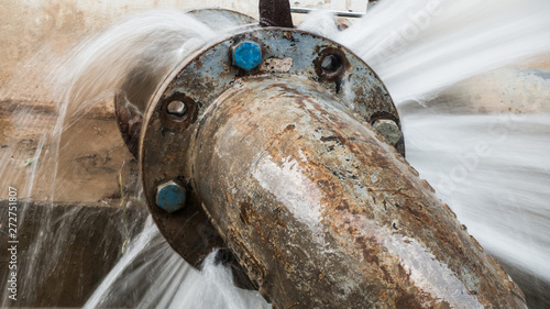 metal pipe with valve is leaking in water treatment plant Poster Mural XXL