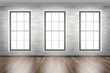 © tarikdiz - empty room interior design in loft style with wooden floor brick wall three windows