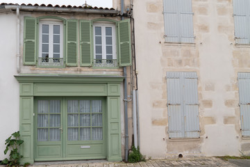 Wall Mural - village on Isle de Re Saint Martin de Re village France with old house and green grey shutter