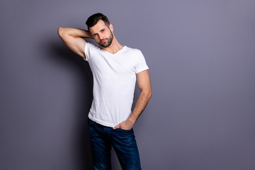 Portrait of gorgeous nice charming pretty man millennial he his good-looking touch head neck palm hand wear fashionable modern clothing isolated grey background