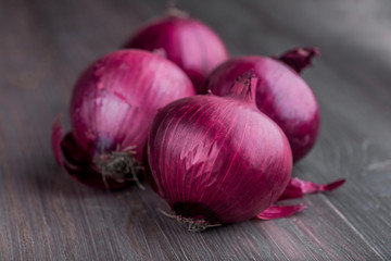 Wall Mural - red onions on rustic wood