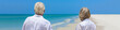 © Darren Baker - Retired Senior Couple on Tropical Beach Panorama Web Banner