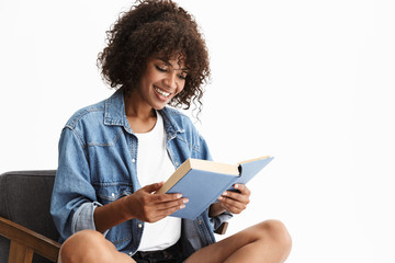 Wall Mural - Attractive young african woman wearing denim