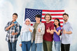 © Pixel-Shot - Group of students near wall with USA flag