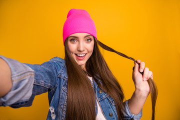 Poster - Close up photo beautiful amazing she her stylish lady make take selfies cheerfully beaming smile friendly teen millennial wear specs casual jeans denim jacket pink hat isolated yellow background