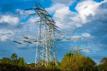 Power Poles and blue Sky, big Clouds in Background, Blue cloudy Sky