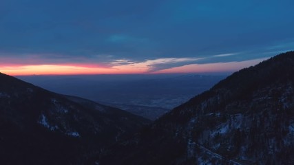Wall Mural - Colourful sky at evening time, view from the mountains