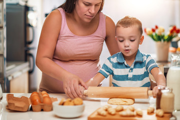 Sticker - Pregnant mother and her son enjoying in kitchen