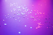 Silver star glitter on ultraviolet abstract background. Place for design